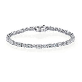 Emerald cut and rounds tennis bracelet