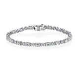 Emerald cut and rounds tennis bracelet