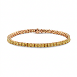 Yellow diamonds often lose their impact when set in white metal, which is why we leaned in — rose gold bracelet, front view packshot