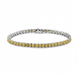 Yellow diamonds often lose their impact when set in white metal, which is why we leaned in — white gold bracelet, front view packshot