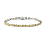 Yellow gold is the right choice here. It deepens the saturation of these pear cut yellow d — white gold bracelet, front view packshot