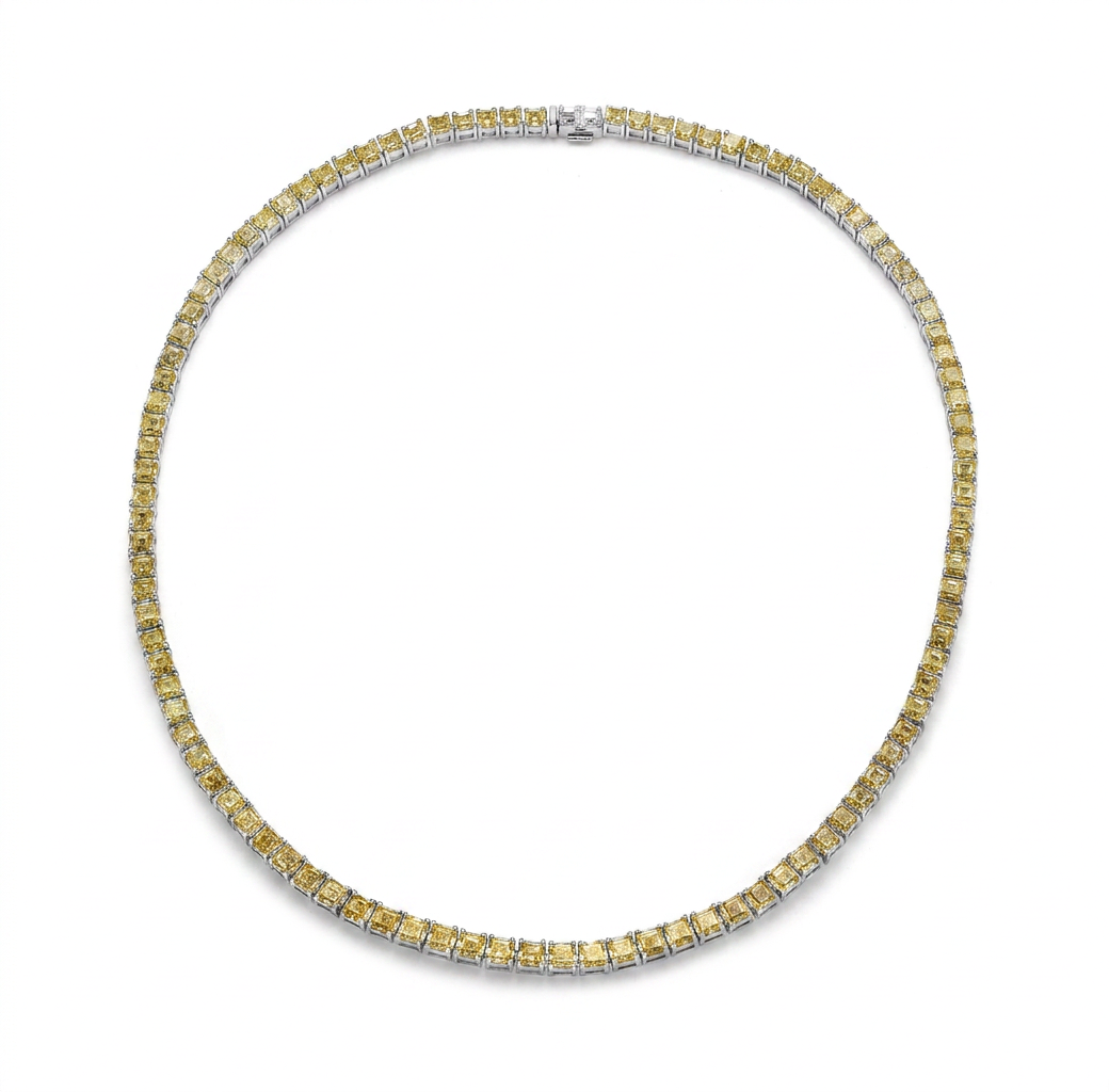 Yellow diamonds are notoriously difficult to match, but this necklace manages a remarkably — white gold necklace, front view packshot
