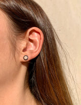 Lifestyle - Black and white diamond stud in pave setting in 18k rose gold