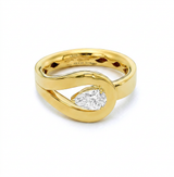 Packshot - Pear shape diamond knot ring set in 18k yellow gold