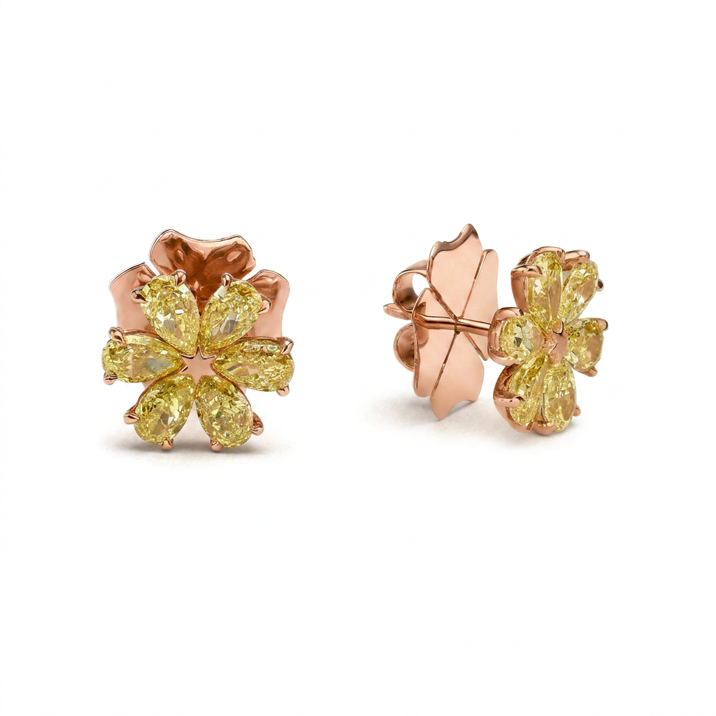 front few packshot of fancy yellow flower studs made from pear shapes 