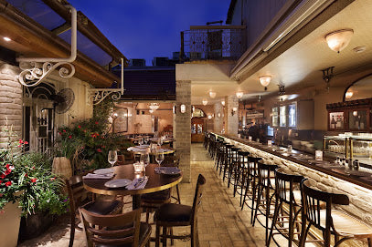 An outdoor patio and bar area for grabbing a wine in Tel Aviv.