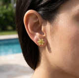 A SUN DRENCHED GARDEN IN BLOOM ETERNAL RADIANCE — earrings lifestyle shot, Close-up of a woman's ear wearing the earring, hair tucked back