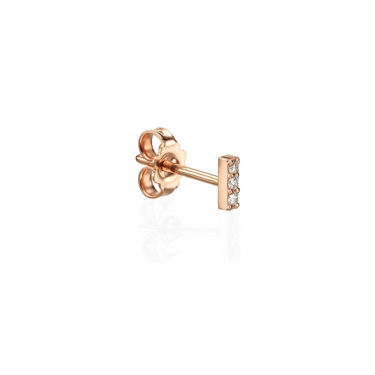 PAckshot - A single rose gold bar earring with three setted diamonds, presented against a white background.