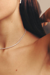 Diamond Tennis Necklace on neck whie gold